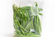 Flowpacker for vegetables, such as green beans and brussels sprouts