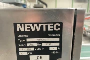 Newtec 2014A weigher with 2 x PEB 40AE bag filling machine with tape closing